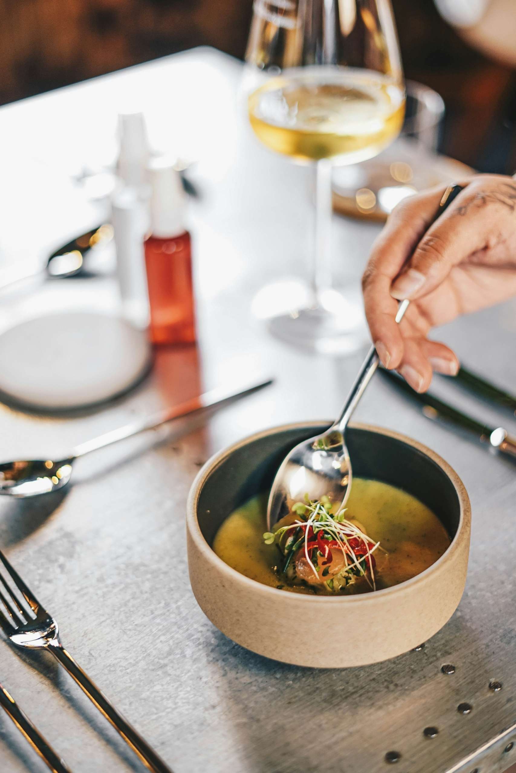 A bowl of soup with a spoon in it